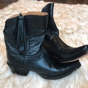 Lucchese Black boots with fringe tassels.